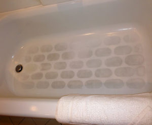 Acid used to create a non-slip tub floor